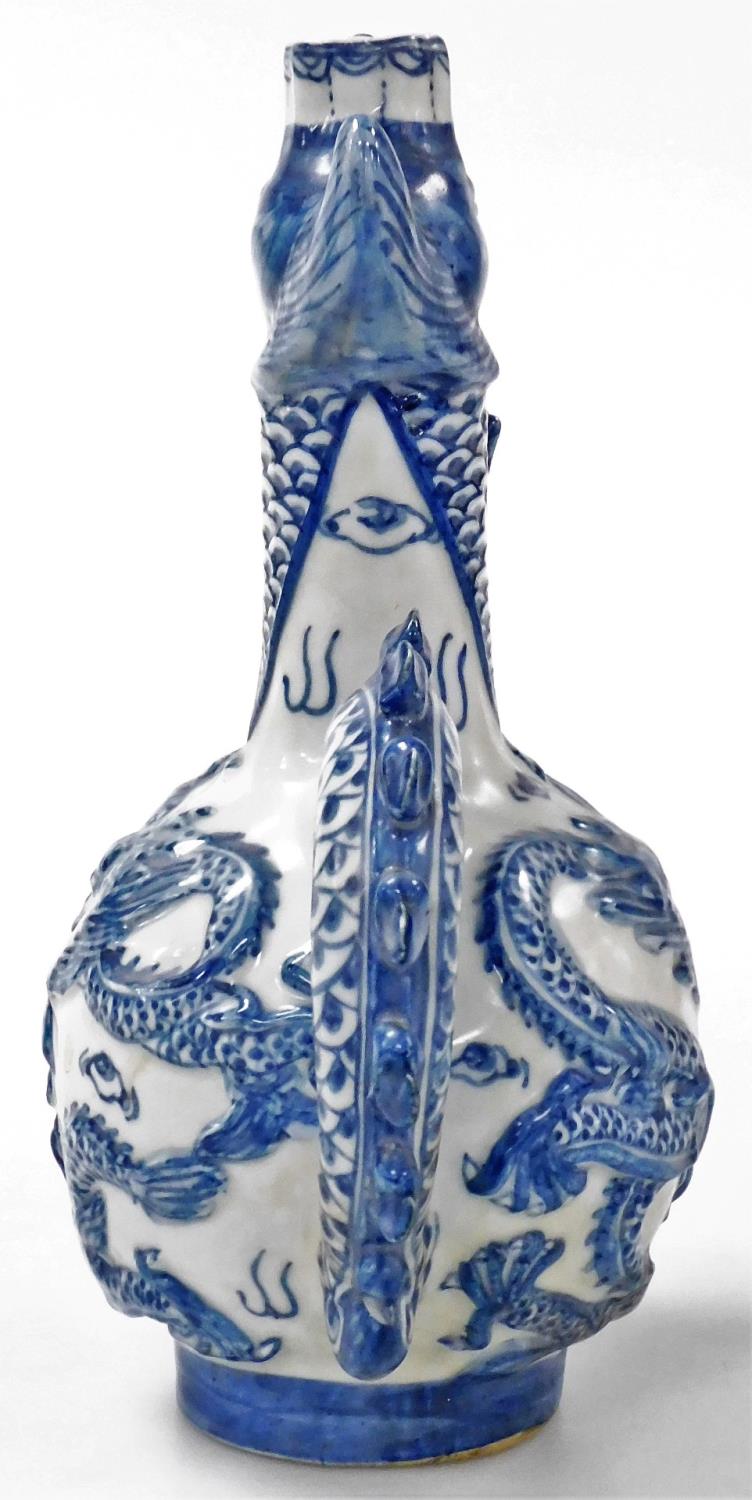 A 20thC Chinese blue and white bottle jug, with a dragon's head spout and tail handle, the bottle wi - Image 4 of 6