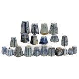 A collection of Chinese blue and white square tapered incense holders. (21)