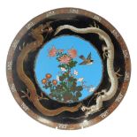 A Meiji period Japanese cloisonne dish, decorated centrally with a bird and flowering tree branch su