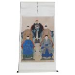 A Chinese ceremonial ancestor portrait scroll, depicting five seated family members, watercolour on