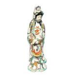 A 19thC Chinese porcelain figure modelled as Guan Yin, decorated in coloured enamels with gilt highl