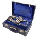 An F & B Besson New Standard cornet, three valves, 32cm long, cased.