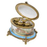 A 19thC French Sevres style porcelain and gilt metal perfume casket, of oval form, the hinged lid ha