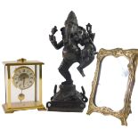 A 20thC bronze figure of Ganesh, 35cm high, an Art Nouveau brass mirror with easel back and an eight