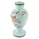 A late 19thC glass vase, hand painted with bird and flowers, on a turquoise ground, 33cm high.