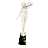 An Art Deco parian figure of a standing nude lady, on marble base, unsigned, 29cm high.
