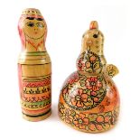 A USSR wooden doll, stencilled with flowers 18cm high and a similar decorated chicken. (2)