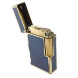 A 20thC Dupont pocket lighter, in blue, with gilt metal trim, marked beneath, 6cm high.