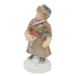 A mid 20thC Pesochnoye Moscow bisque porcelain figure of a boy, with hatchet, marked beneath, 22cm h