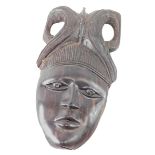 An African tribal carved wooden wall face mask, 31cm high.