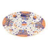 A 19thC Derby porcelain Imari pattern meat plate, of oval form, D mark beneath, 52cm wide. (AF)