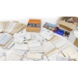 A large quantity of QEII Wilding and Machin stamps, tied to envelopes with various postmarks, variou
