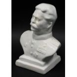 A Dulevo style hollow porcelain bust of Stalin, undecorated, 24cm high.