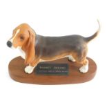 A Beswick Connoisseur model of a basset hound, matt finish, on wooden plinth base, marked to the bas