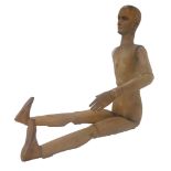 A late 19thC French artist's pine lay figure, with articulated limbs, unmarked, 58cm high. (AF)