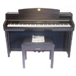 A Yamaha Clavinova GH3 electric piano, 143cm long, with stool.