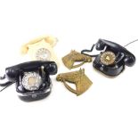 A FTR marked telephone, with front articulated dial, in black with gilt stencilling, 15cm wide, a cr