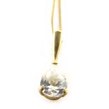 A diamond pendant of tear drop cut, on a very fine 9ct gold chain, the stone of 0.30ct approx, inclu
