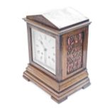 A 19thC mahogany cased mantel clock, the silvered metal 17cm wide Roman numeric dial with etched scr