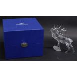 A Swarovski crystal figurine stag, 291431, 13cm high. (boxed)