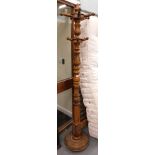 A heavily carved oak hat and coat stand.