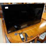 A Panasonic 40" colour television, with wire, TX-40FS503B.
