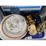 A child's nursery plate, cup and saucer, two Goebel girl figures, Crown Devon dog, brass sifter, etc