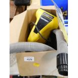 A Karcher K25E power brush vacuum cleaner, partially boxed.