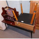 A Sherborne retro teak lidded stool, newspaper rack, teak coffee table. The upholstery in this lot d