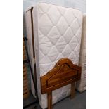 A divan style single bed, with Dorlux Life Form Venice single mattress, and pine headboard.