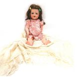 An early 20thC Armand Marseille bisque headed doll, number 1330, numbered 7, with sleep eyes, open m