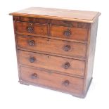 A Victorian mahogany chest of drawers, the top with a moulded edge, above two short and three long d