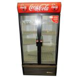 A Coca-Cola advertising fridge, with two doors, number 1849830, with condition B cooler, 210cm high.