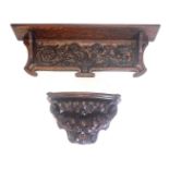 A late 19thC carved oak wall shelf, with shaped base, 74cm wide, and similar wall bracket or shelf,