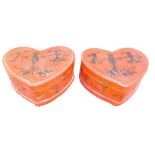 A pair of Chinese red lacquer and gilt decorated heart shaped boxes or covers, 32cm wide. This lot i