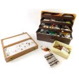 Various fly fishing items, spools, fly box containing a small quantity of flies, a Wheatley tin, 10c