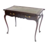 An Edwardian mahogany writing table, the rectangular top with rounded corners and a green tooled lea