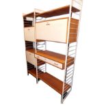 A quantity of Staples Ladderax shelving, with three cream painted supports, three cabinet sections,