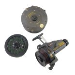 A Shakespeare Beaulite fishing reel, a Cardinal 355 fixed spool carp reel, 10cm high, etc. (3)