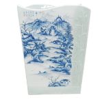 A late 20th/21stC celadon porcelain slab vase, decorated in blue with a mountainous landscape, scrip