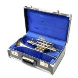 A Sovereign cornet, with three valves, 37cm long. (cased)