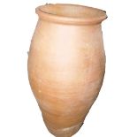 A Continental coiled pottery olive jar, 80cm high. This lot is located at Oundle, Near Peterborough,