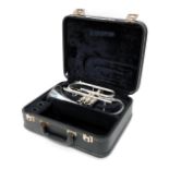 A Besson 700 cornet, with three valves, 33cm long, in Besson case.