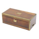 An early Victorian rosewood and brass campaign style writing box, the hinged top enclosing a tooled