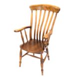 A 19thC beech, ash and elm lath back open armchair, with spindled turned arm supports, turned legs a