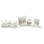 A group of Aynsley Wild Tudor pattern porcelain ornaments, including a wheelbarrow, pair of Wellingt