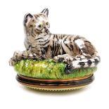 A Halcyon Days enamel and porcelain bonbonniere, modelled as a seated cat, 5cm high, boxed.