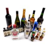 An assortment of liqueurs and spirits, a bottle of Poly Remy Gala Brut, assorted miniatures, Lyme Ba