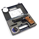 A Beretta CO² air pistol, calibre 4.5mm. (.177), cased with instructions.