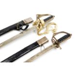 Two Indian reproduction cavalry swords.